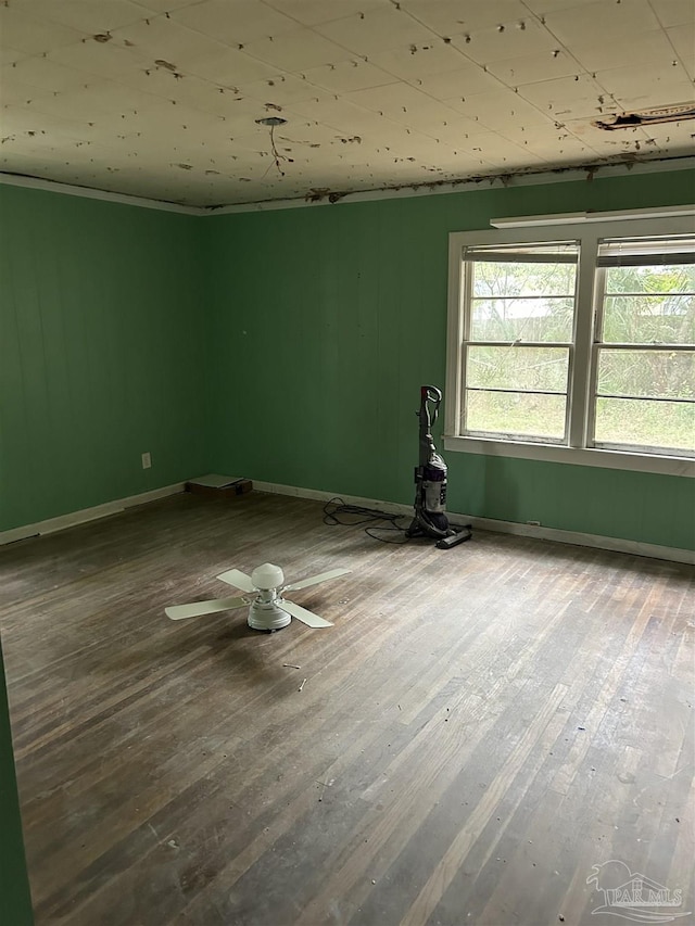 unfurnished room featuring hardwood / wood-style floors