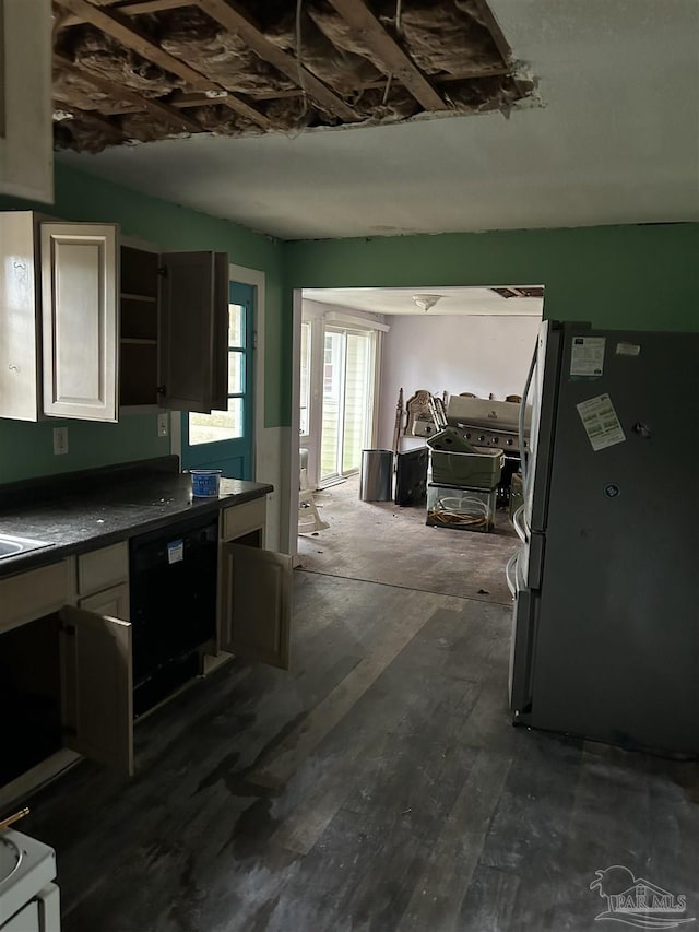 kitchen with dishwasher, stainless steel fridge, dark hardwood / wood-style flooring, and white cabinets