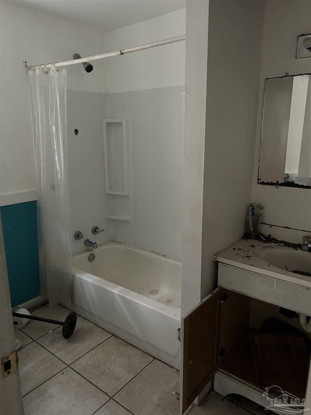 bathroom with tile patterned flooring, shower / bath combo, and vanity