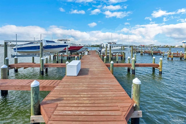 view of dock featuring a water view and boat lift