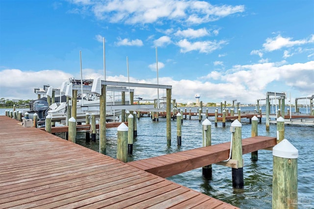 view of dock featuring a water view and boat lift