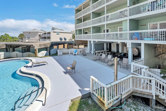 pool featuring a patio area