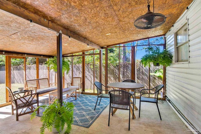 unfurnished sunroom with a healthy amount of sunlight