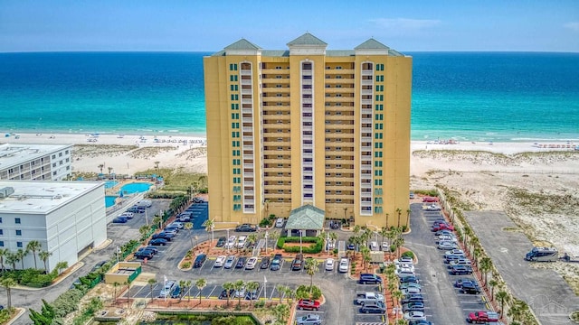 bird's eye view with a view of the beach and a water view