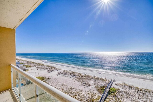 property view of water featuring a beach view