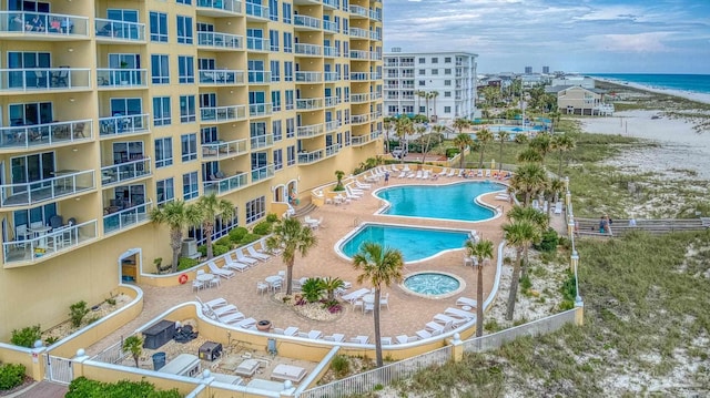 view of pool featuring a water view