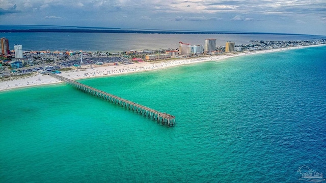 bird's eye view featuring a water view and a view of the beach