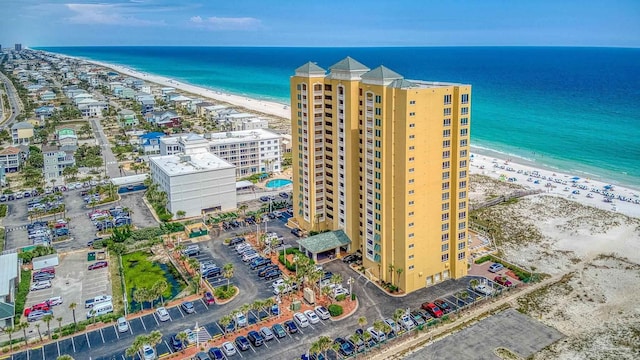 aerial view with a view of the beach and a water view