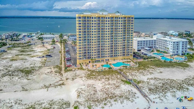 birds eye view of property featuring a water view