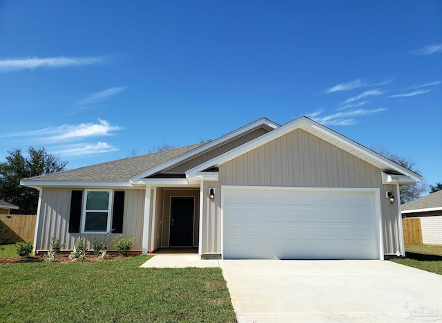 ranch-style home with driveway, a garage, and a shingled roof
