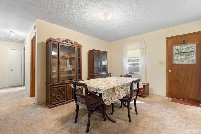 carpeted dining room featuring a textured ceiling and cooling unit