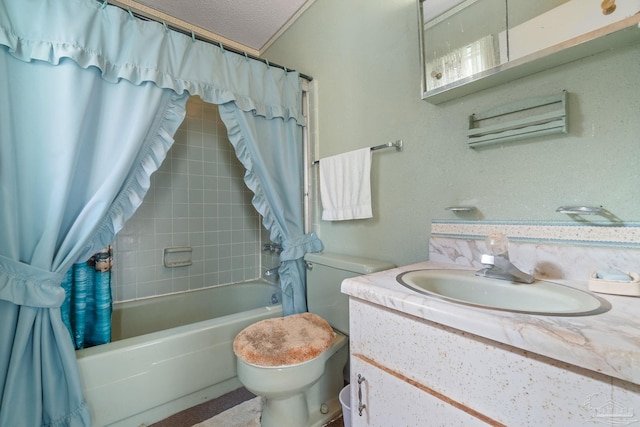 full bathroom with vanity, shower / bath combo, a textured ceiling, and toilet