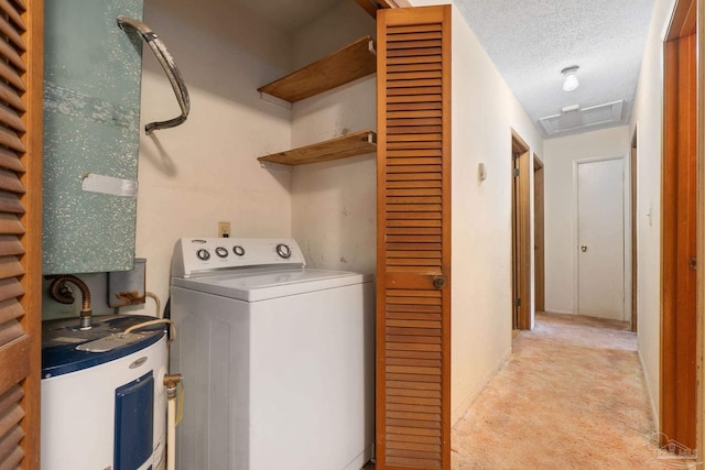 clothes washing area with light carpet, a textured ceiling, washer / clothes dryer, and water heater