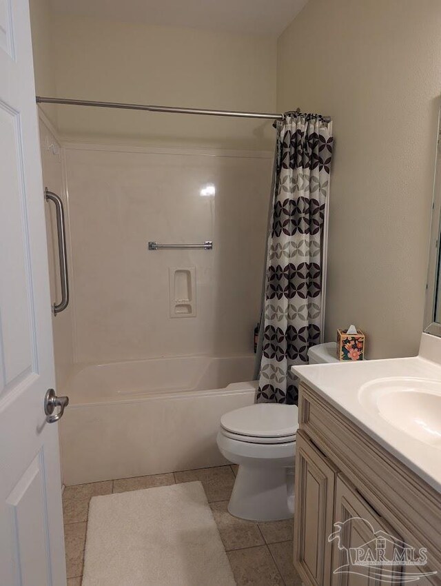 full bathroom with vanity, toilet, shower / bath combo, and tile patterned flooring