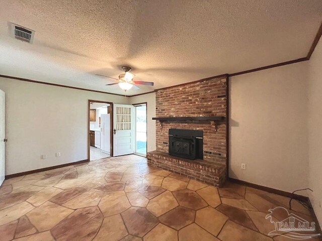 unfurnished living room featuring ceiling fan, a textured ceiling, a brick fireplace, and light tile patterned floors