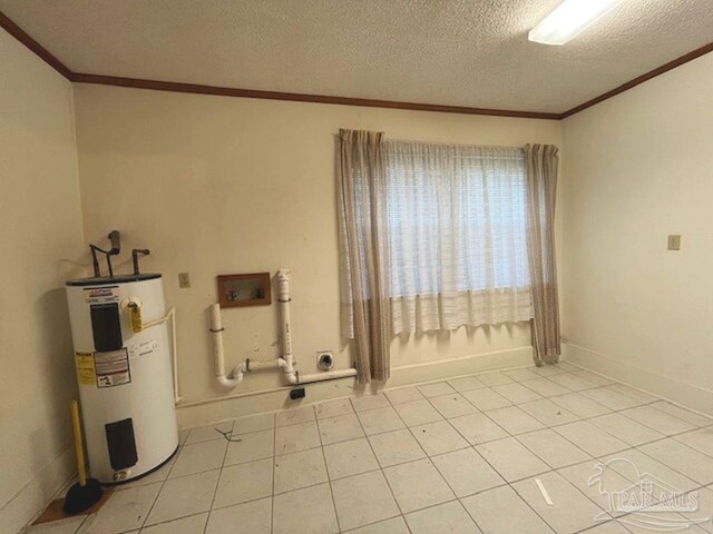 empty room with light tile patterned floors, ornamental molding, a textured ceiling, and water heater