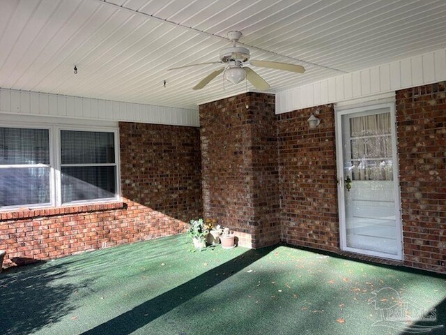 view of patio / terrace featuring ceiling fan