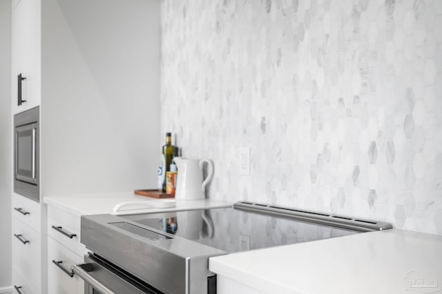 interior details featuring white cabinetry