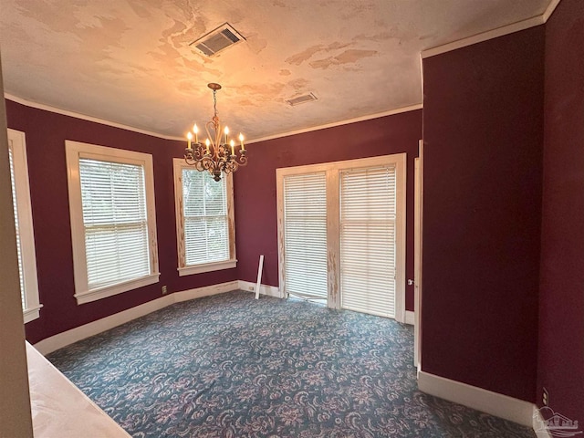 spare room with dark carpet, crown molding, and a textured ceiling