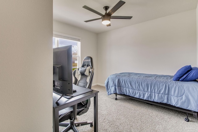 bedroom featuring carpet, baseboards, and a ceiling fan