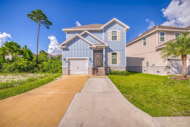 view of front of house with a garage and a front yard