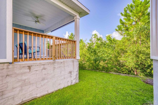 view of yard featuring ceiling fan