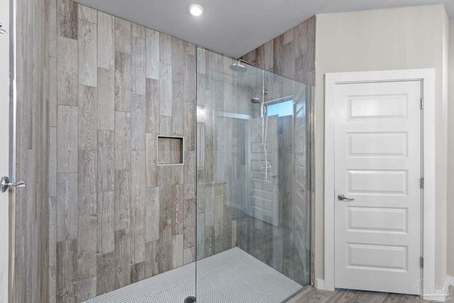 bathroom with a stall shower