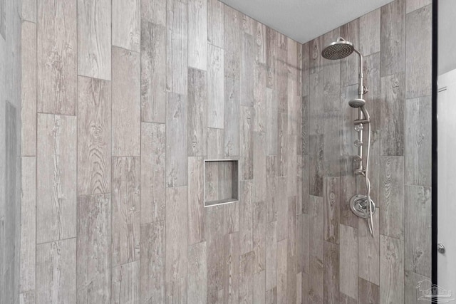 details with a tile shower