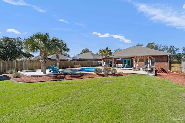 exterior space featuring a patio area, a fenced backyard, and a fenced in pool