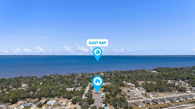 birds eye view of property featuring a water view and a residential view