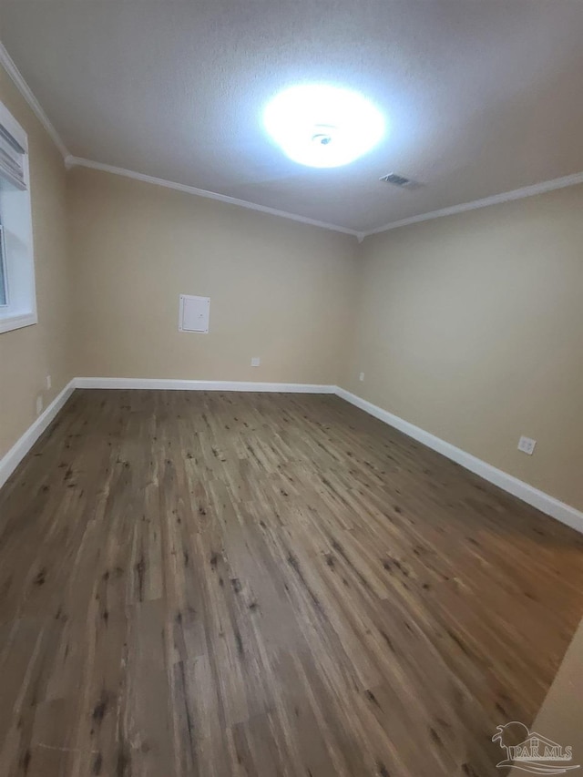3111 Zepp Ln, Pace, FL 32571 - unfurnished room with ornamental molding and wood finished floors