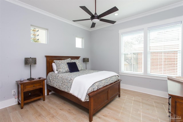 bedroom with crown molding, baseboards, recessed lighting, light wood-style flooring, and a ceiling fan