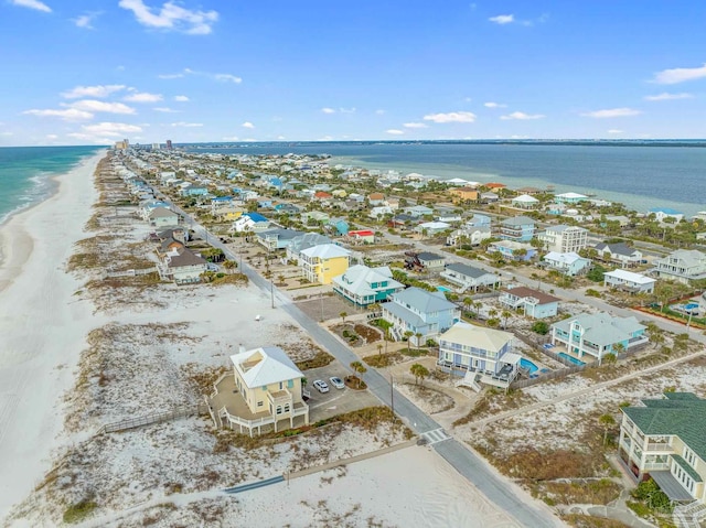 aerial view with a beach view and a water view