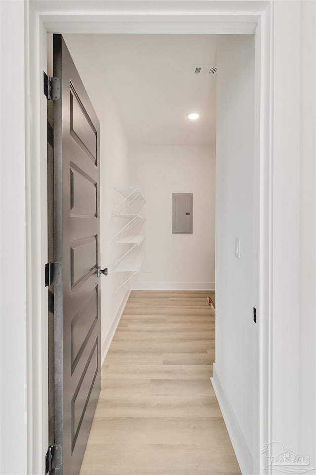2116 W De Soto St, Pensacola, FL 32505 - hallway featuring baseboards, light wood-style flooring, electric panel, and recessed lighting