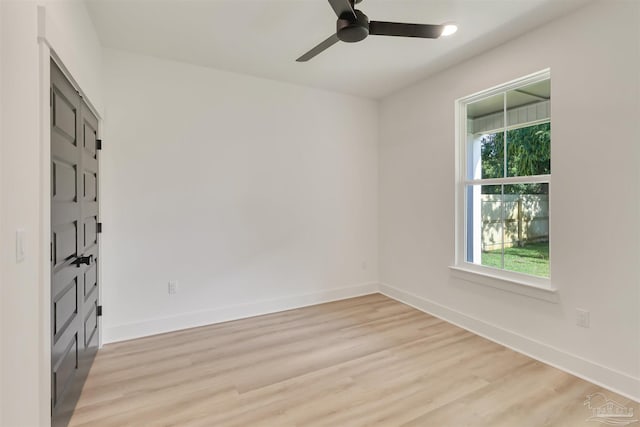2116 W De Soto St, Pensacola, FL 32505 - empty room with light wood-style floors, baseboards, and ceiling fan