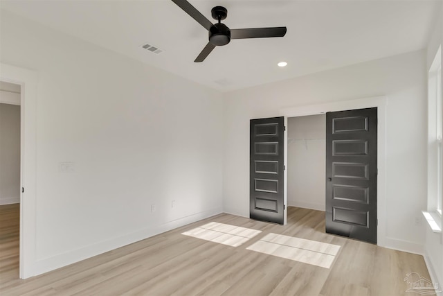 2116 W De Soto St, Pensacola, FL 32505 - unfurnished bedroom with light wood finished floors, baseboards, a closet, recessed lighting, and ceiling fan