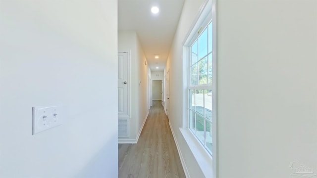 hallway featuring light wood-type flooring