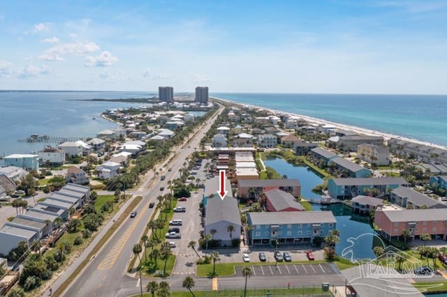 drone / aerial view with a water view