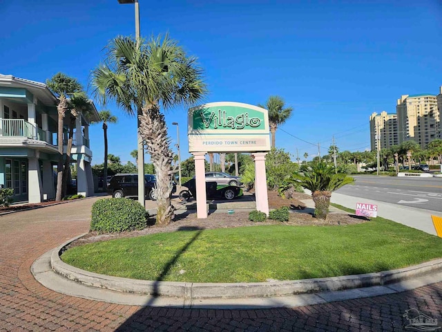 community sign with a lawn