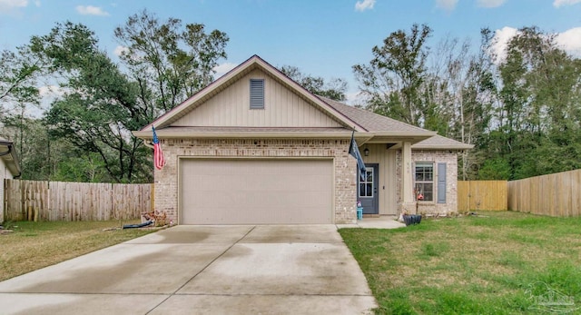 view of front of house with a garage, brick siding, fence, concrete driveway, and a front lawn