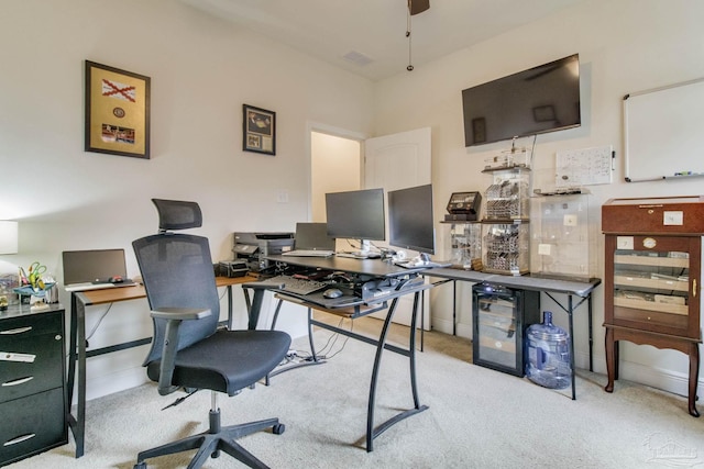 carpeted office space with visible vents