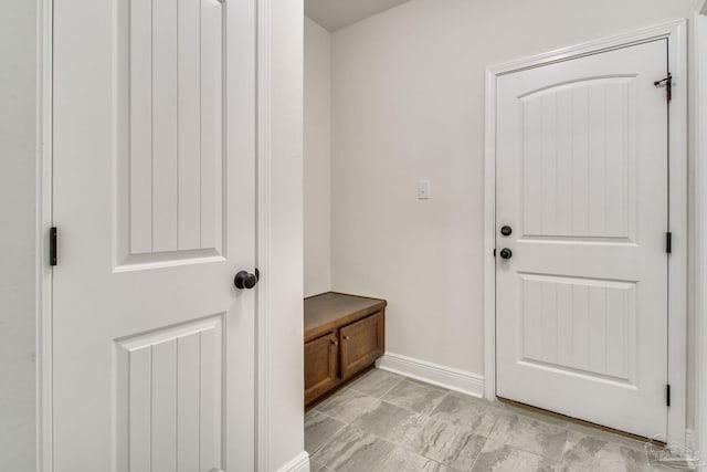 mudroom featuring baseboards