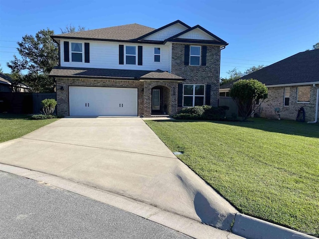 view of front property with a garage and a front yard