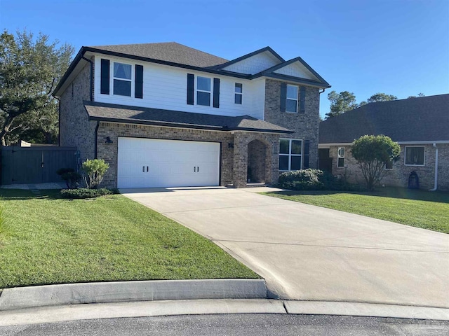 view of front property with a garage and a front lawn