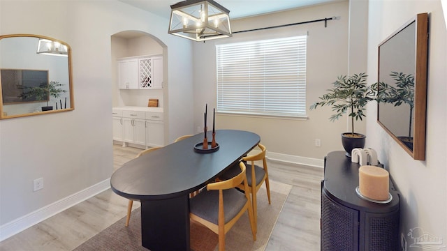 dining space featuring light hardwood / wood-style flooring