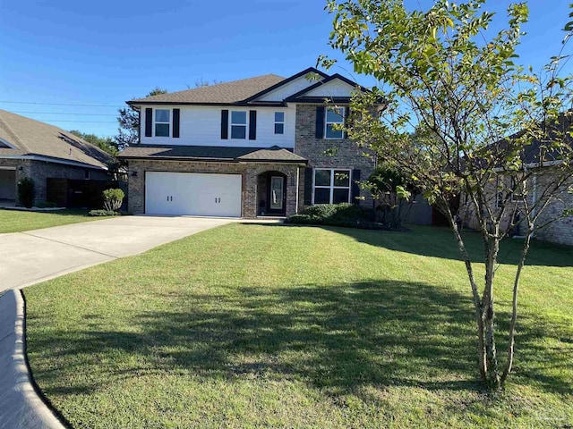 front of property featuring a front lawn and a garage