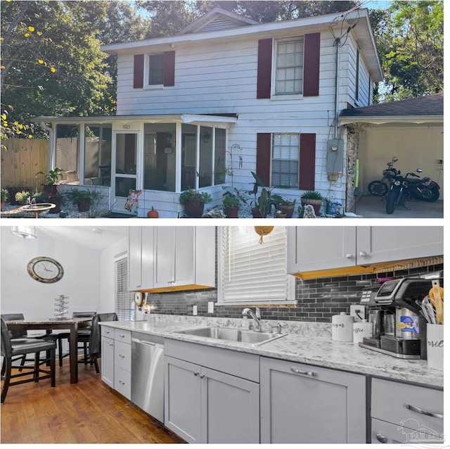 rear view of property featuring a sunroom, sink, and exterior kitchen