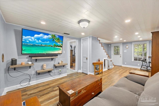 living room featuring wooden ceiling and light wood-type flooring