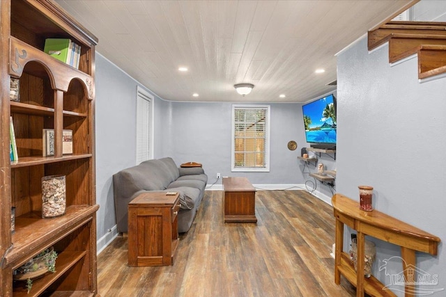 living area with hardwood / wood-style flooring