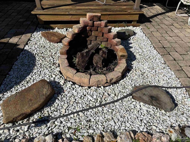 details featuring an outdoor fire pit